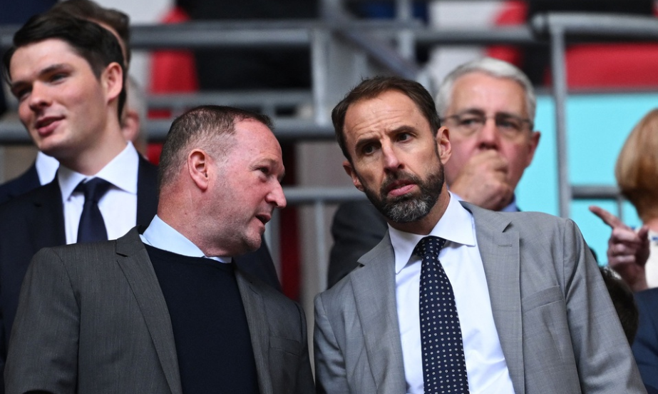 England's head coach Gareth Southgate (R) attends the English FA Cup final football match between Manchester City and Manchester United at Wembley stadium, in London, on May 25, 2024