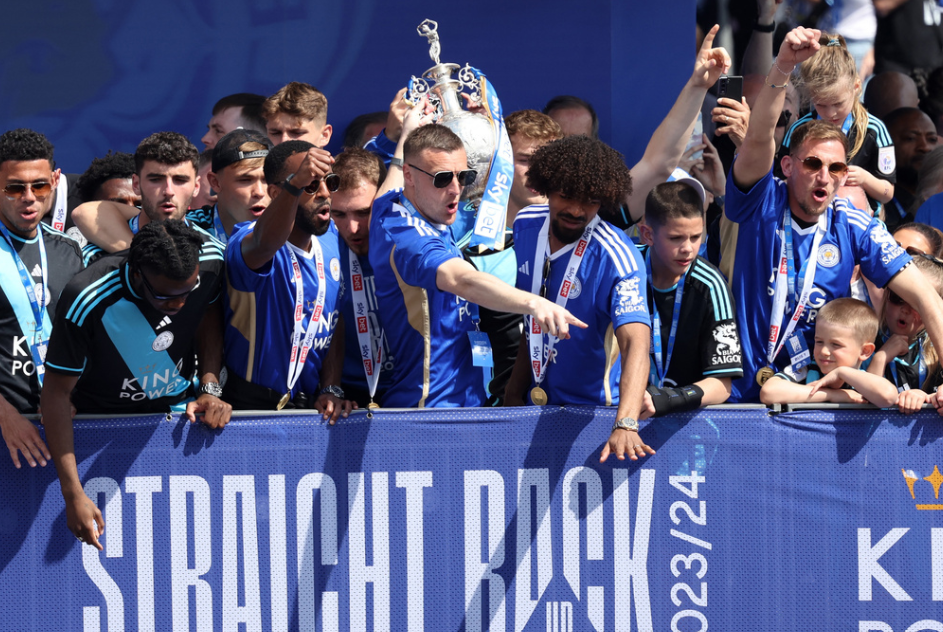 Soccer Football - Championship - Leicester City Victory Parade - Leicester, Britain - May 5, 2024 Leicester City's Jamie Vardy holds up a trophy during the victory parade Action