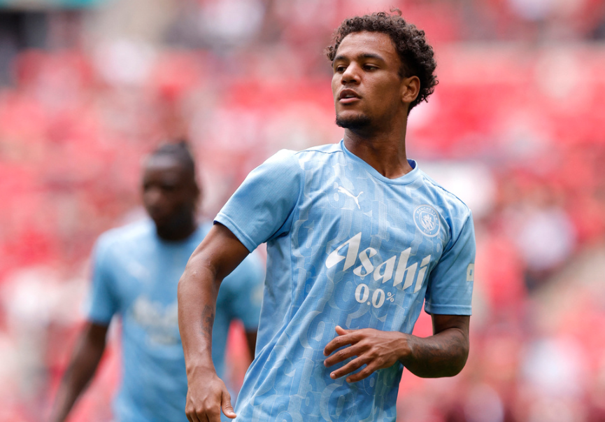 Soccer Football - Community Shield - Manchester United v Manchester City - Wembley Stadium, London, Britain - August 10, 2024 Manchester City's Oscar Bobb during the warm up before the match