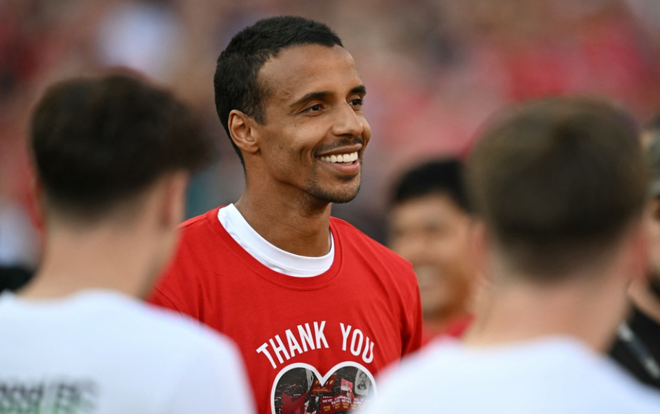 Liverpool's German-born Cameroonian defender #32 Joel Matip says goodbye to the fans after the English Premier League football match between Liverpool and Wolverhampton Wanderers at Anfield in Liverpool, north west England on May 19, 2024.