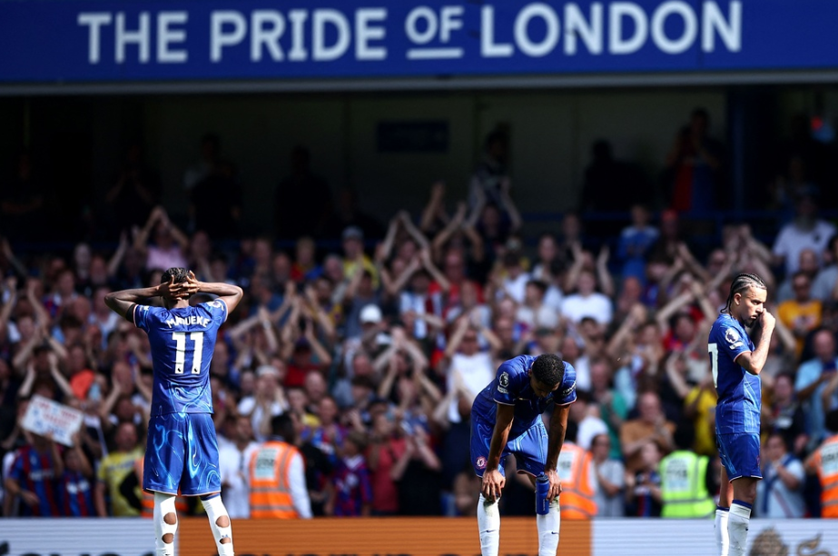 Chelsea players react after the English Premier League football match between Chelsea and Crystal Palace at Stamford Bridge in London on September 1, 2024