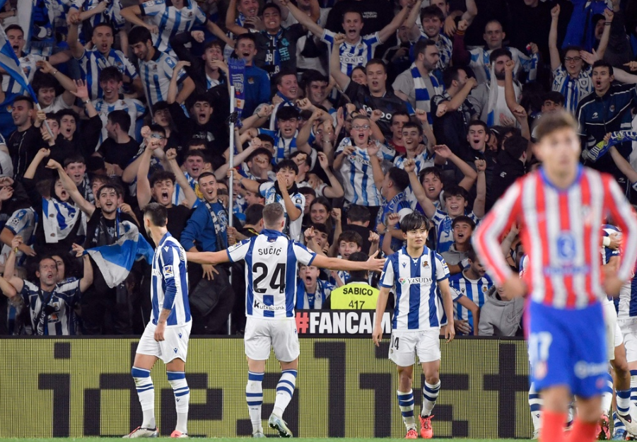 Real Sociedad's Croatian midfielder #24 Luka Susic celebrates scoring an equalizing goal during the Spanish league football match between Real Sociedad and Club Atletico de Madrid at the Anoeta stadium in San Sebastian on October 6, 2024.