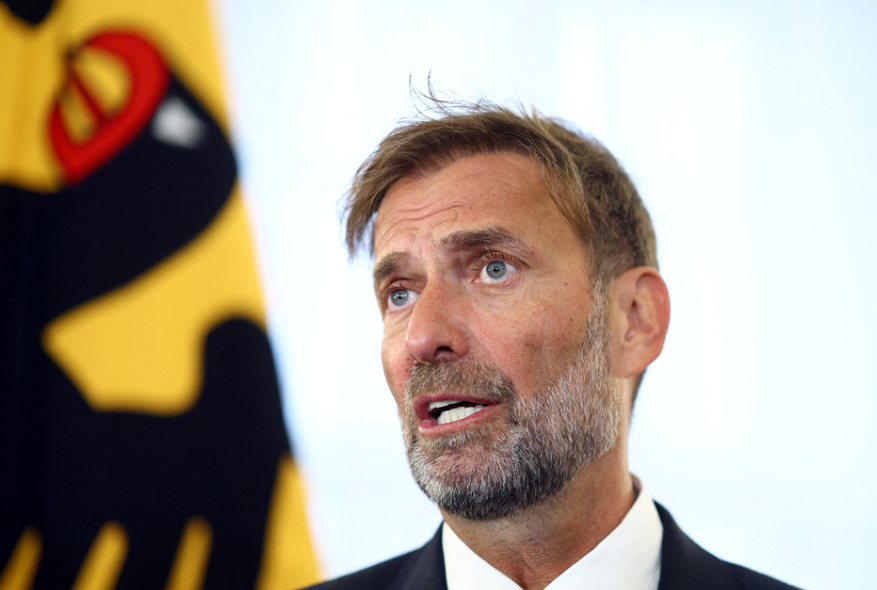 Former FC Liverpool manager Juergen Klopp reacts after receiving the Order of Merit of the Federal Republic of Germany at Bellevue Palace to mark the unification day in Berlin, October 1, 2024. 