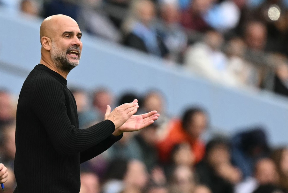 
Emneknagger
fbl
Horizontal
Manchester City's Spanish manager Pep Guardiola applauds English referee Peter Bankes for booking Manchester City's Brazilian goalkeeper #31 Ederson during the English Premier League football match between Manchester City and Fulham at the Etihad Stadium in Manchester, north west England, on October 5, 2024