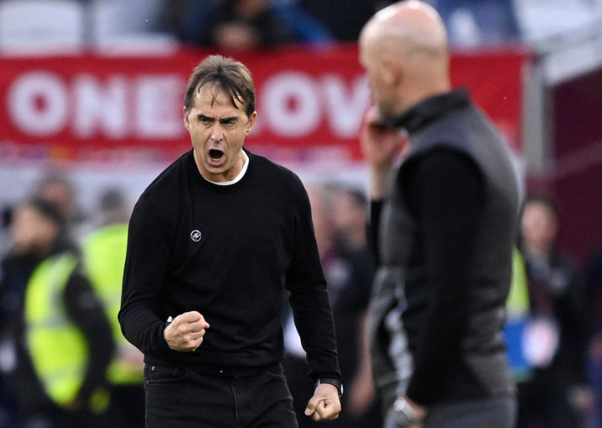 Soccer Football - Premier League - West Ham United v Manchester United - London Stadium, London, Britain - October 27, 2024 West Ham United manager Julen Lopetegui celebrates after the match as Manchester United manager Erik ten Hag looks on