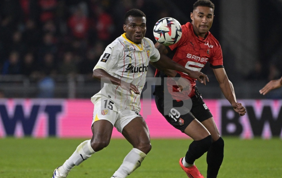 Lens' Nigerian midfielder #15 Hamzat Ojediran (L) fights for the ball with Rennes' Danish forward #19 Henrik Meister during the French L1 football match between Stade Rennais FC and RC Lens at Roazhon Park stadium in Rennes, western France on September 21, 2024.