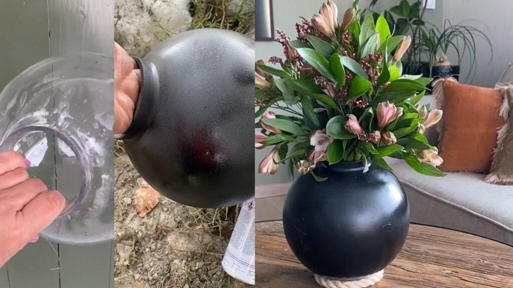 Bildet viser en kreativ DIY-prosess hvor Lise Wolden forvandler en gammel lampekuppel i glass til en elegant vase. Først holdes den gjennomsiktige kuppelen opp, deretter vises den under spraymaling i en matt svart farge. Til slutt står den ferdige vasen på et trebord, fylt med friske blomster i grønne og rosa toner. Bakgrunnen har en sofakrok med puter i varme jordfarger.