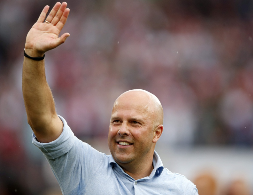 Feyenoord's Dutch headcoach Arne Slot waves during a Dutch Eredivisie first division football match between Feyenoord and Excelsior Rotterdam at the Feyenoord Stadium de Kuip in Rotterdam on May 19, 2024.