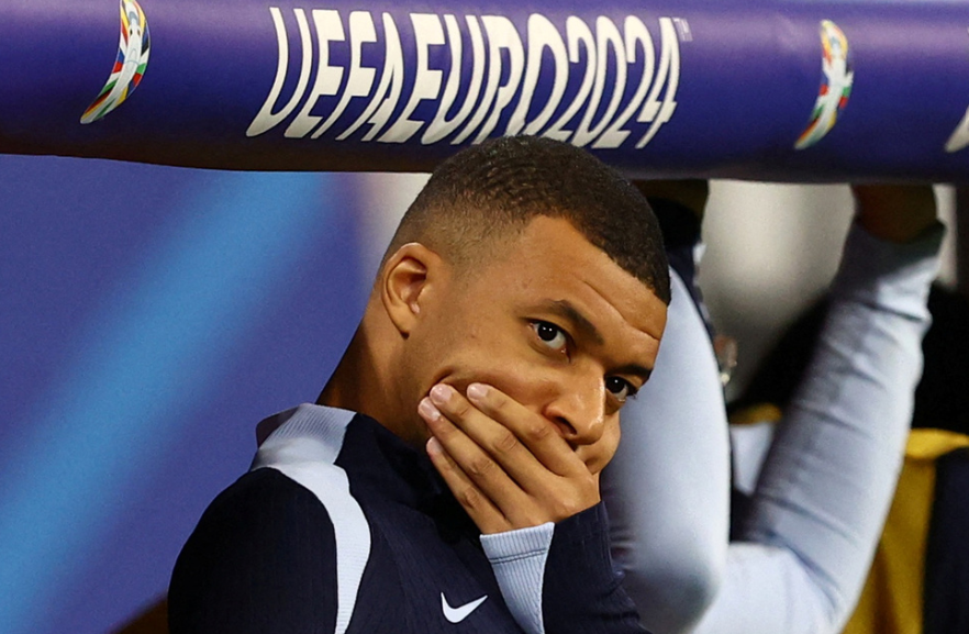 Soccer Football - Euro 2024 - Group D - Netherlands v France - Leipzig Stadium, Leipzig, Germany - June 21, 2024 France's Kylian Mbappe reacts after the match