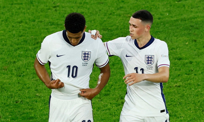 Soccer Football - Euro 2024 - Group C - England v Slovenia - Cologne Stadium, Cologne, Germany - June 25, 2024 England's Jude Bellingham with Phil Foden at half time