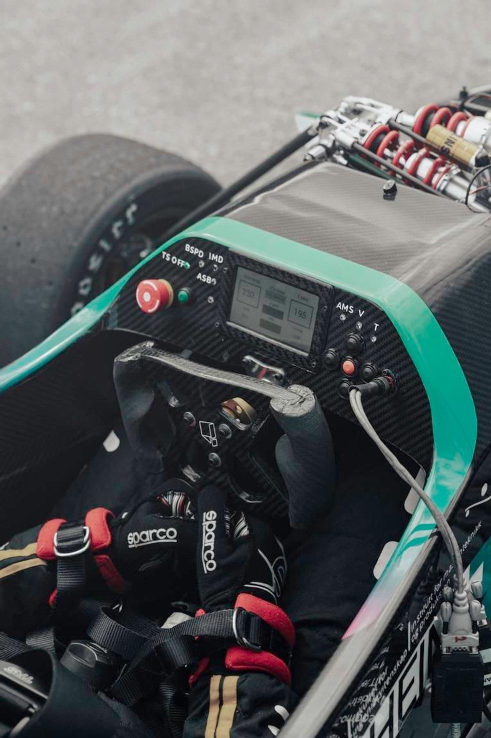 The steering wheel dominates the dashboard in Formula Student.  Photo: NTNU Spin