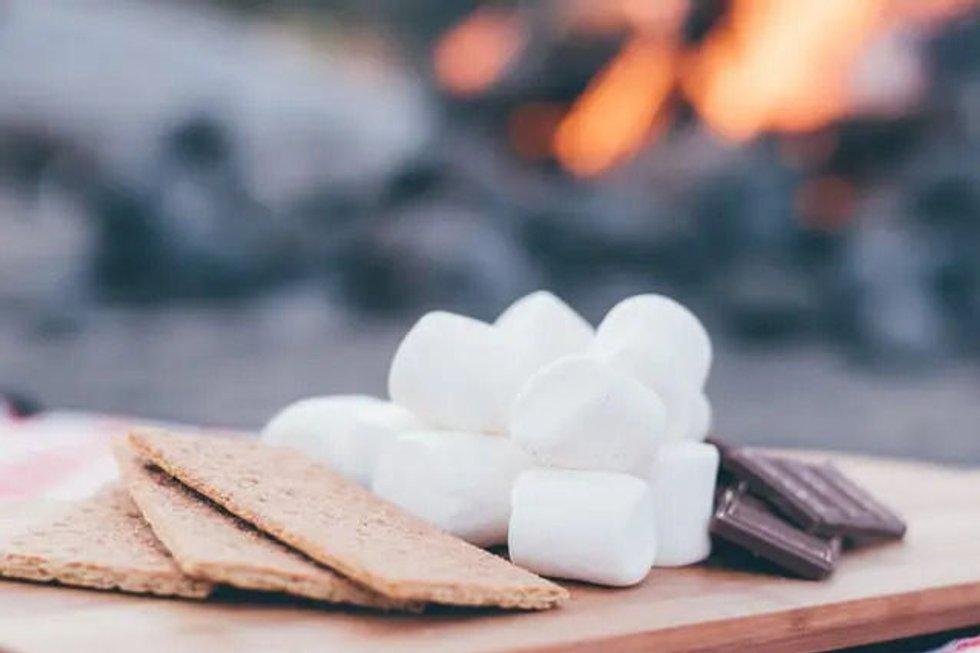 S'mores are made of cookies, marshmallows, and chocolate.