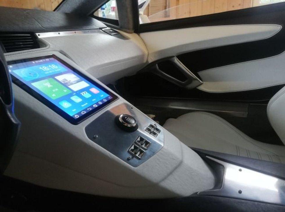 Center console.  The large screen is a Lenovo PC.  Photo: Private