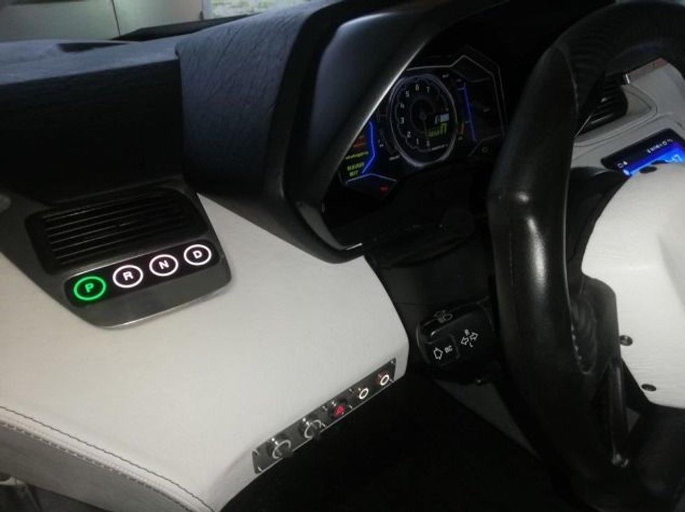 The gear selector is located on the dashboard to the left of the steering wheel.  Photo: Private