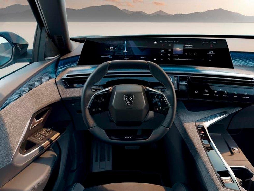 The interior of the Peugeot E-3008 features a new 21-inch screen called Panorama i-Cockpit.  Photo: Peugeot