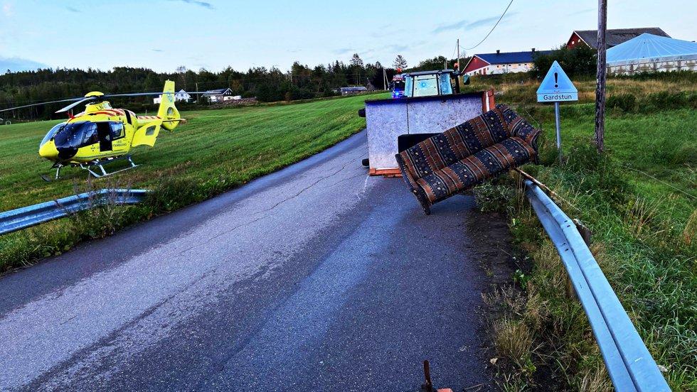 A badly injured when a tractor trailer with several people overturned